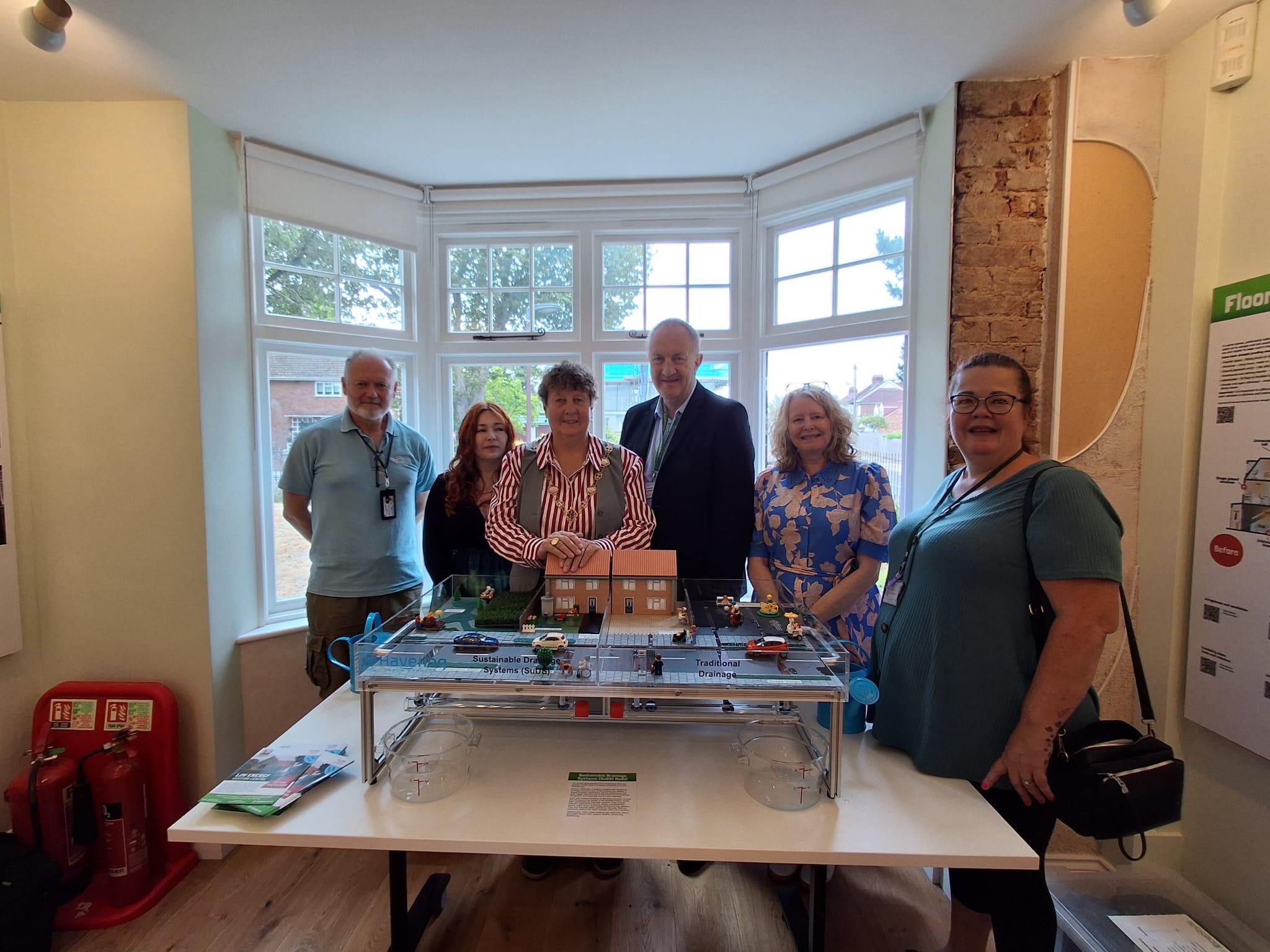Picture of councillors with energy doctors at the low energy visitor centre