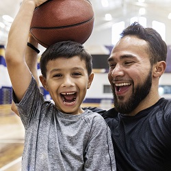 Fostering - Child with basket ball on his head