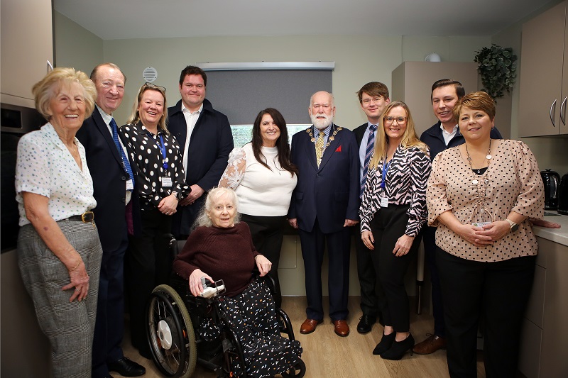 Mayor, Councillor John Mylod (centre), with Councillor Damian White, Hugh Jeffrey and Dan Harrison, Wates Residential, and Councillor John Crowder in the newly refurbished kitchen by Cheryl Cable, the HAD team and service users.
