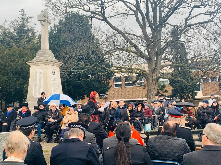 Attendees brave the weather for the Holocaust Memorial Day service.